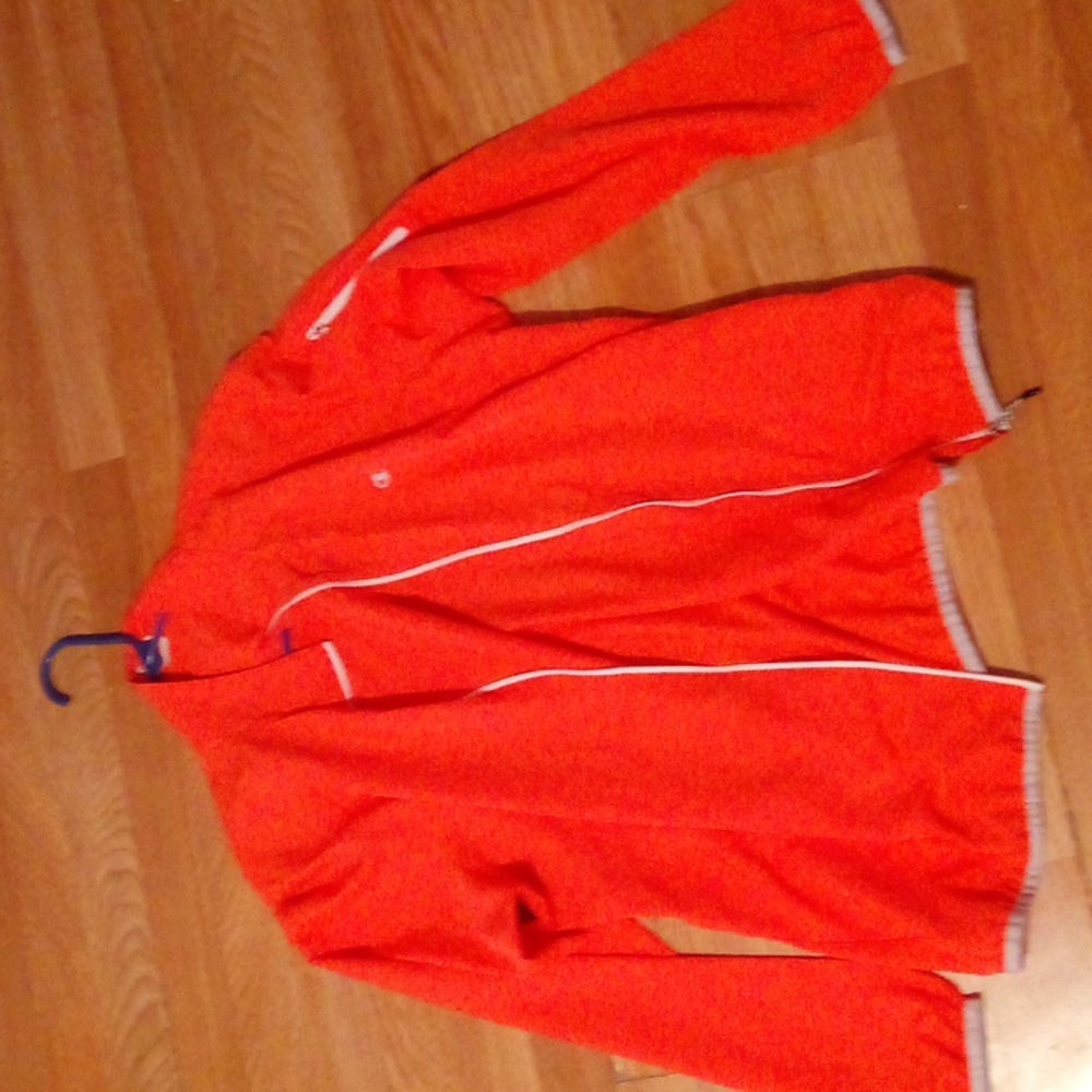 I'm selling this peach color exercising jacket
